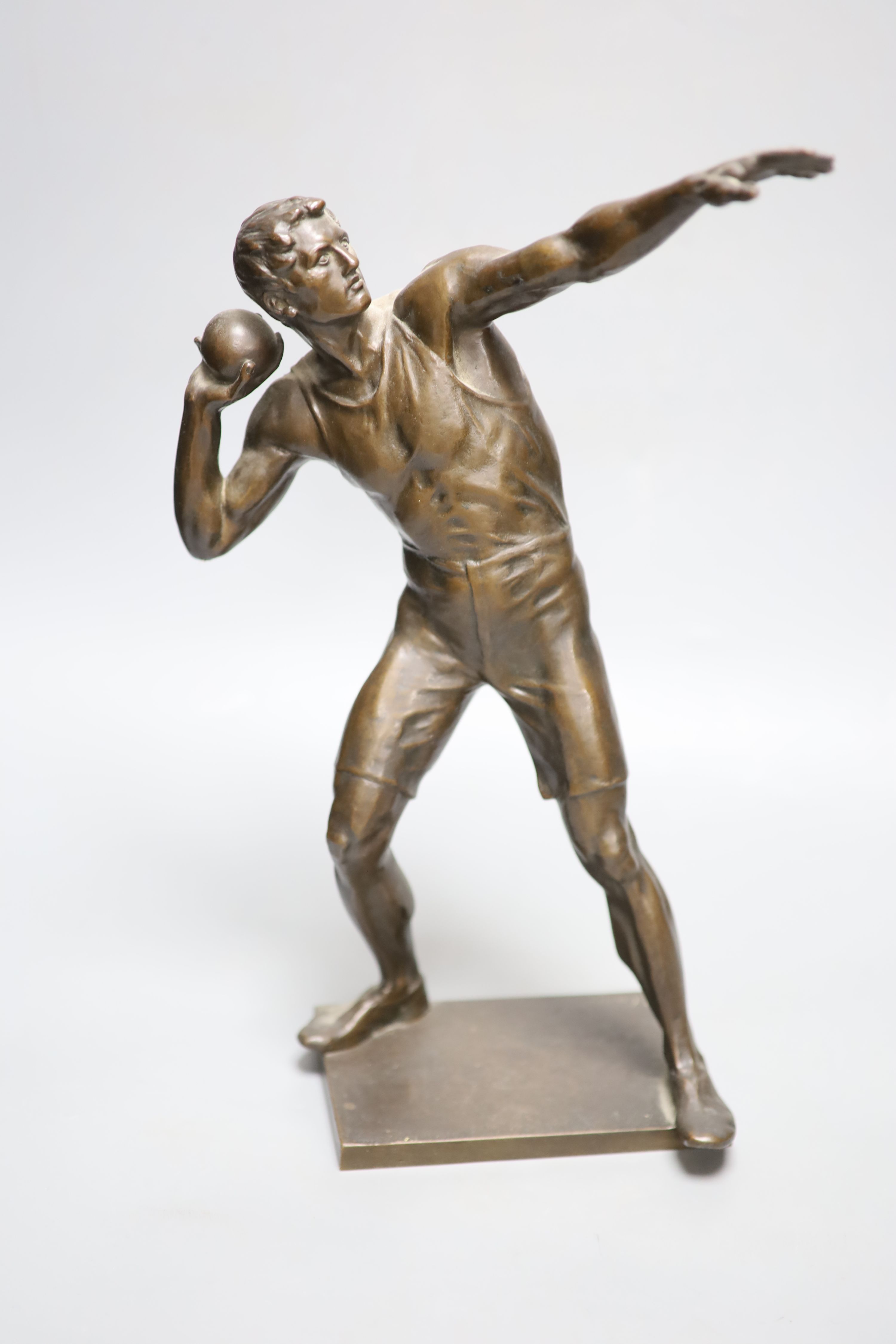 After Robert Cauer (1863-1947) a bronze figure of a shot-putter, c.1925